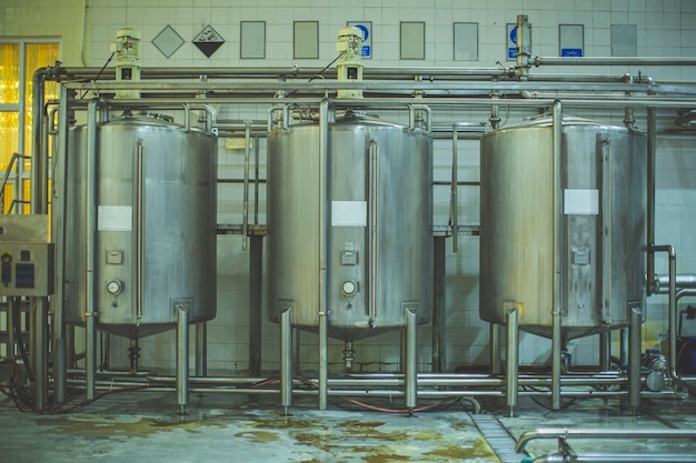 Shiny stainless steel pipes tanks for the cream cosmetic  industry