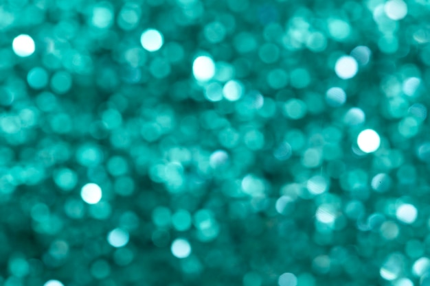 Shiny turquoise glitter textured background