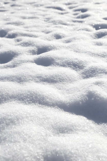 Shiny white soft snow closeup texture