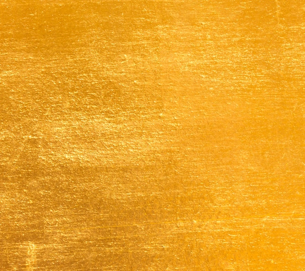 Foto trama di lamina d'oro foglia giallo lucido