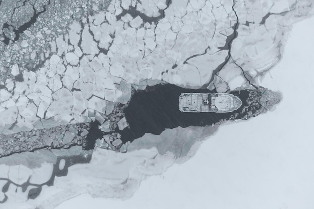 A ship drifting in the ice Air view