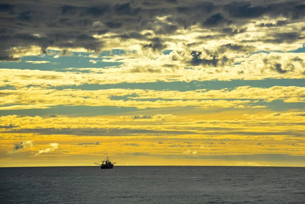 Ship in marine landscape at evening Patagonia Argentina