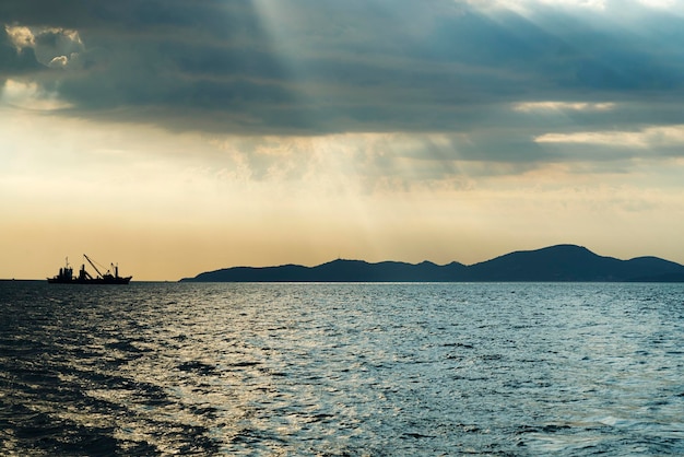 Ship in the sea on the horizon