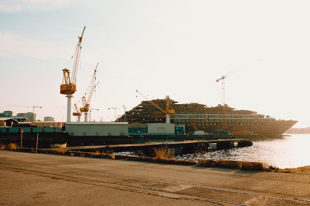 Ships on dock with sunset light