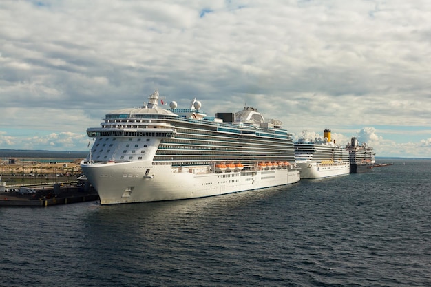 Ships in port on a background of clouds