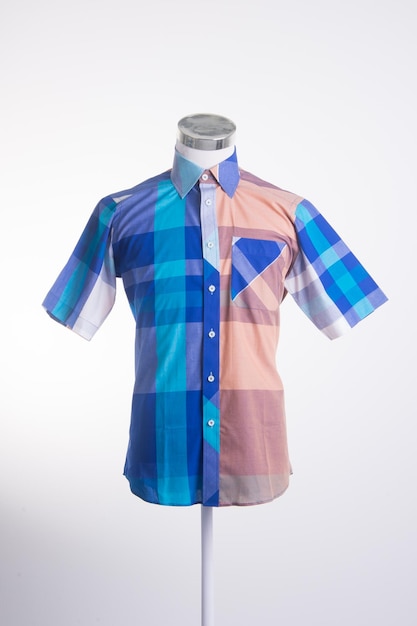 Shirt on mannequin against white background