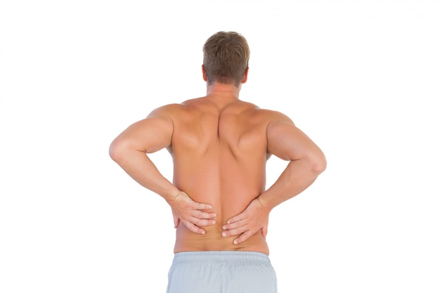 Photo shirtless man suffering from lower back pain