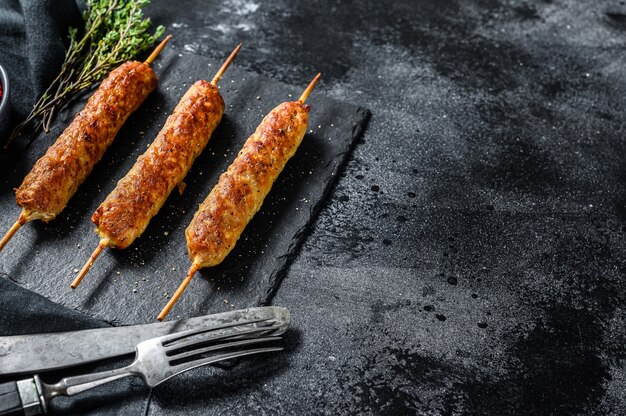 Shish kebab on a stick, from ground beef meat