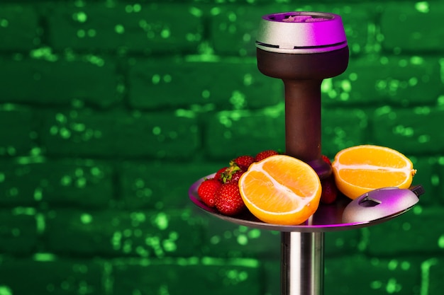 Shisha parts and fresh fruits close up