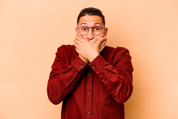 shocked covering mouth with hands