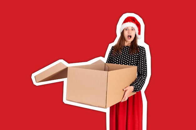 Shocked excited girl standing and holding open big gift carton box. Magazine collage style