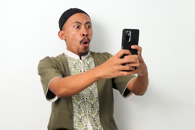 Shocked Indonesian Man Reacts to Phone News