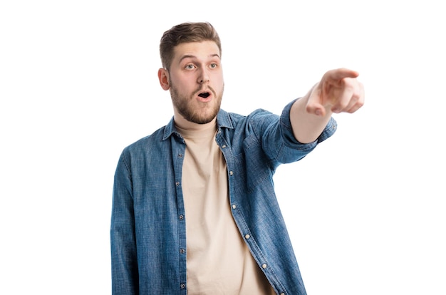 Shocked man pointing with finger