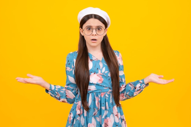 Shocked teenager child portrait isolated on yellow background surprised teenage girl surprised face surprise emotions of teenager girl