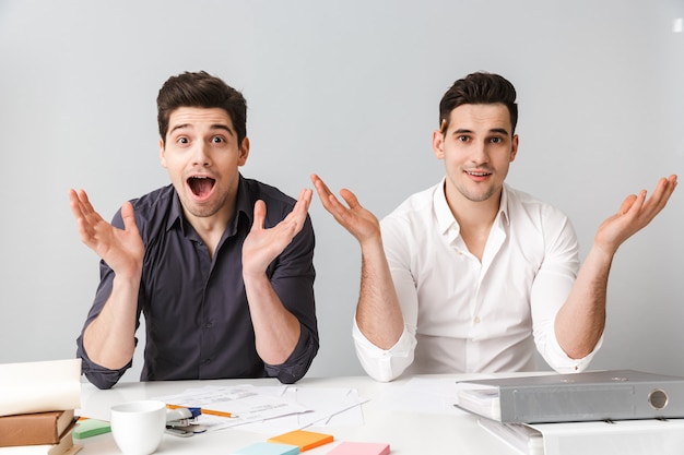 Shocked two young business men