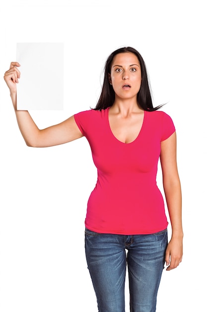 Shocked woman holding piece of paper