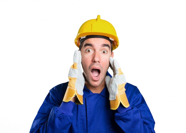 Shocked worker on white background