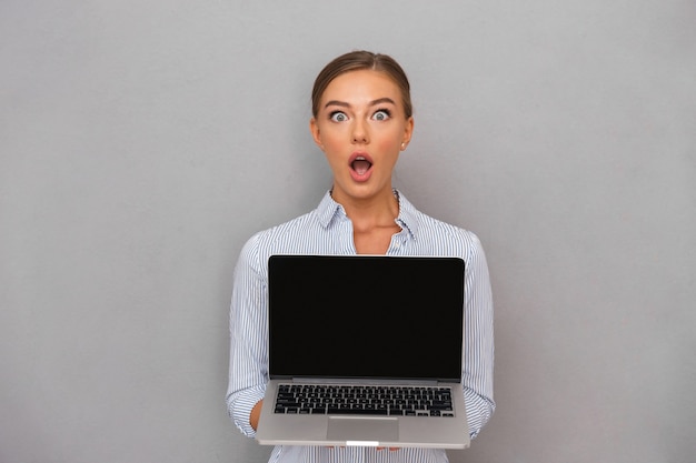 Shocked young businesswoman