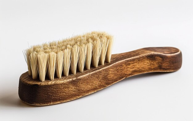 The shoe brush experience in care on white background