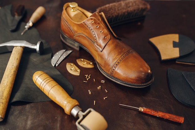 Shoemaker occupation, footwear repair service equipment