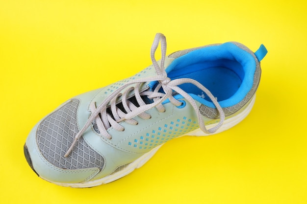 Shoes isolated on yellow 