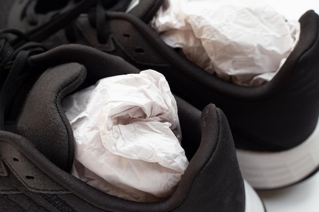 Shoes with crumpled paper Close up