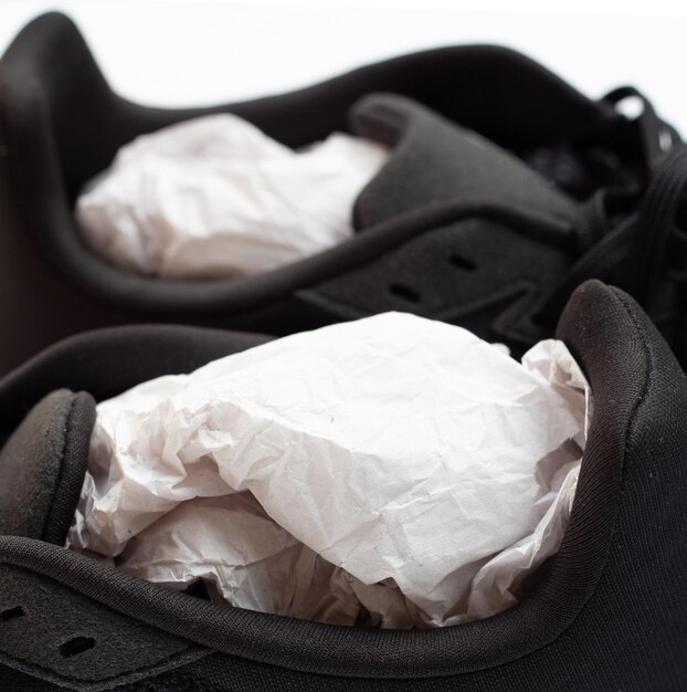 Photo shoes with crumpled paper close up