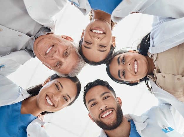 Photo shop of a group of medical practitioners standing together in a huddle