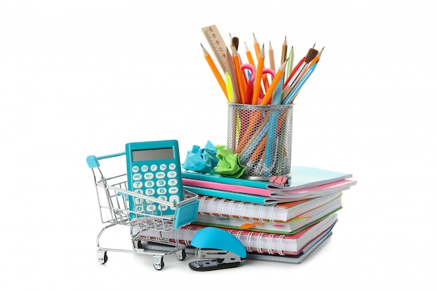 Shop trolley with stationery and copybooks  isolated 