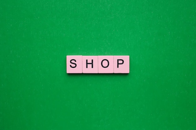 Shop word on the green background.