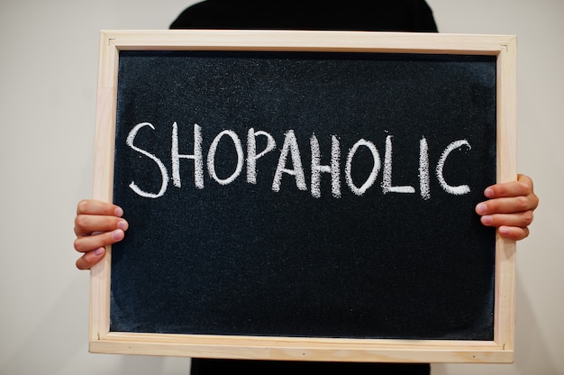 Shopaholic geschreven op bord