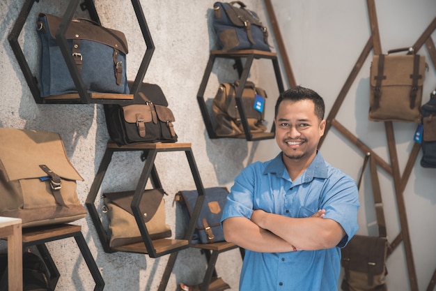 Shopkeeper at his bag store