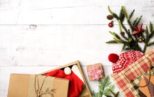 Shopping bag with Christmas gift and decoration on white background. Boxing day and special promotion for end of year sale.