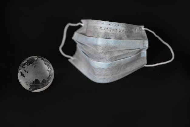 shopping basket cart full of pills and medical supplies over light grey background