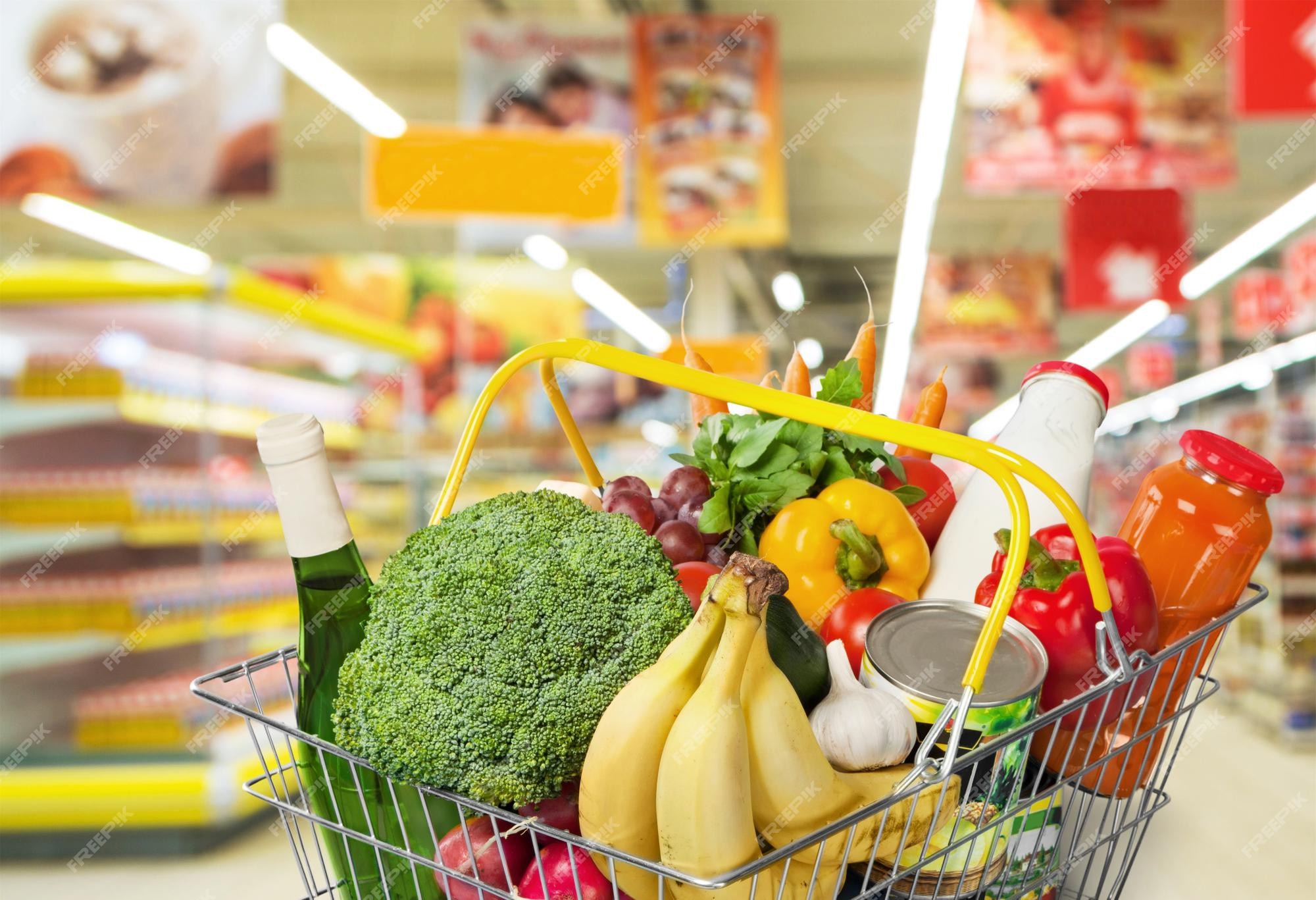 Shopping market basket with variety of grocery products isolate Stock Photo  by ©maxxyustas 153930994