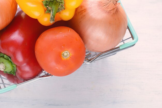 Shopping basket with vegetables