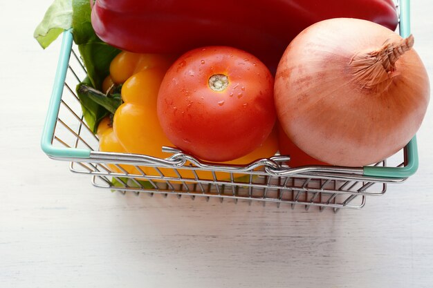 Shopping basket with vegetables