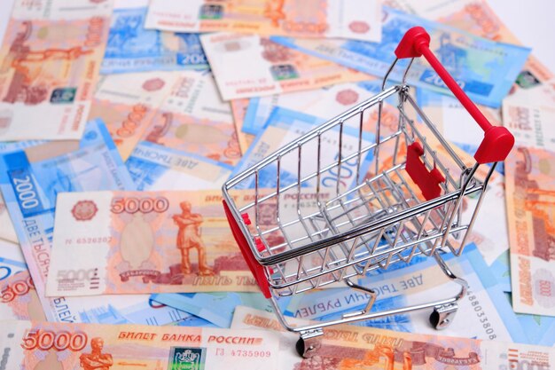 Shopping cart background Russian ruble finance purchases and gas