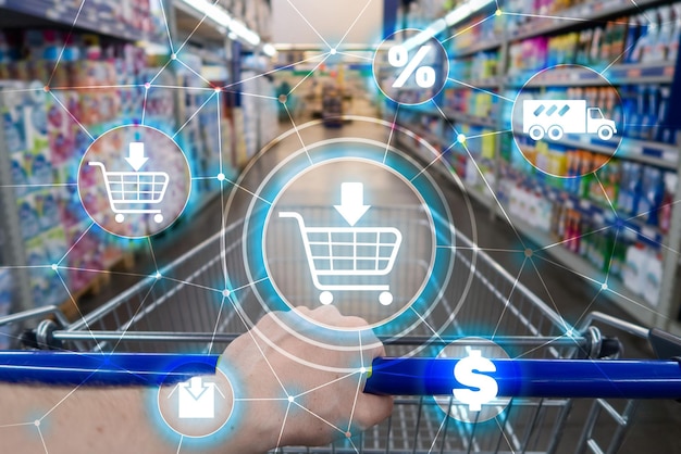 Корзина для покупок Электронная коммерция Концепция распределения маркетинговых каналов на фоне супермаркета.