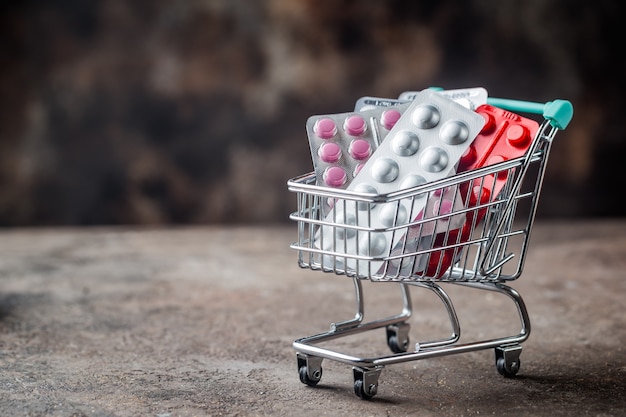 Shopping cart filled with pills