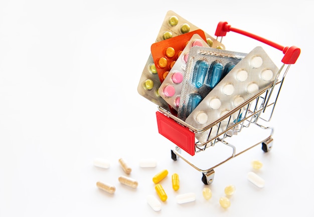 Shopping cart filled with pills