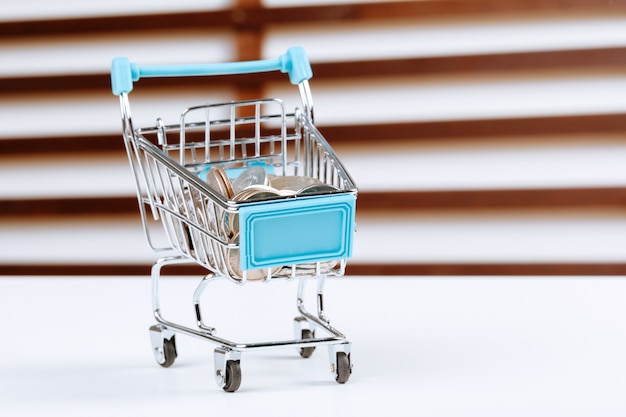 Shopping cart full of coin