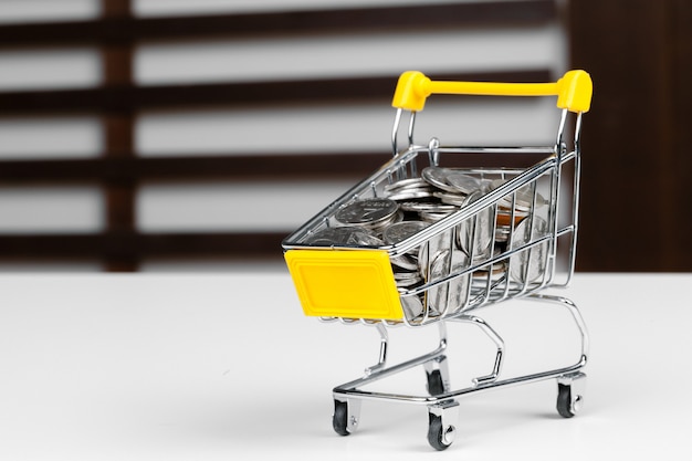 Shopping cart full of coin