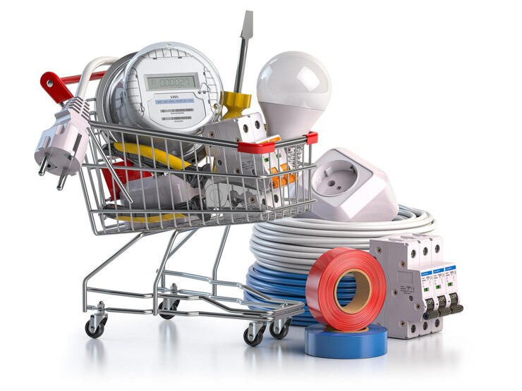 Shopping cart full of electrical components and equipment isolated on white