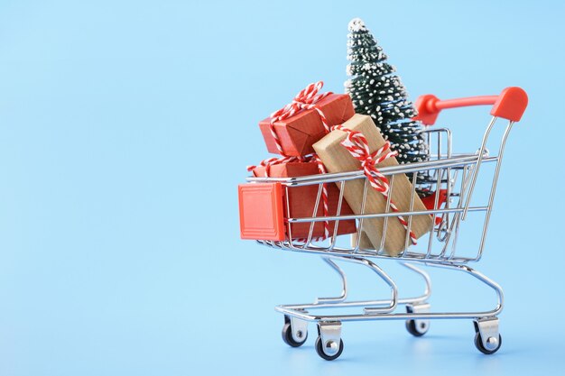 Shopping cart full of various gift boxes