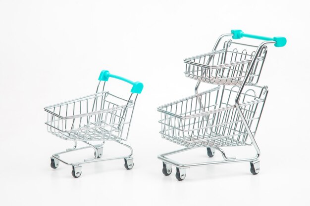 Shopping cart for market groceries on white background