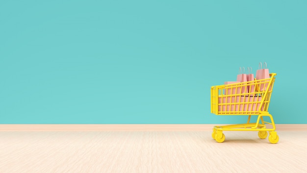 Shopping cart with bags on mint green wall background