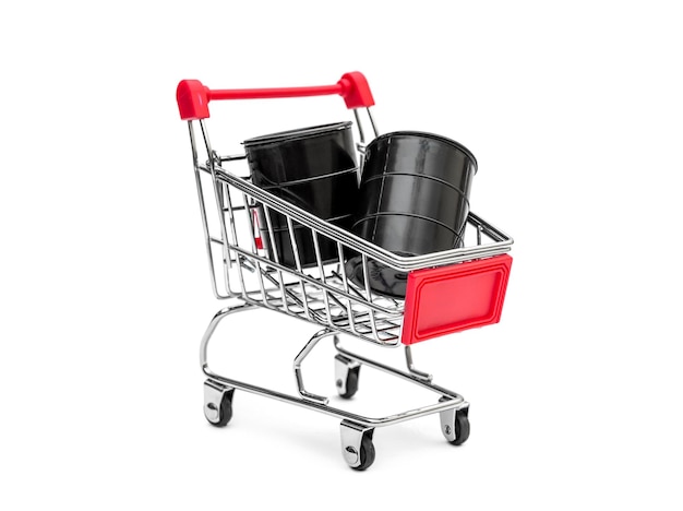 Shopping cart with barrels of crude oil on white