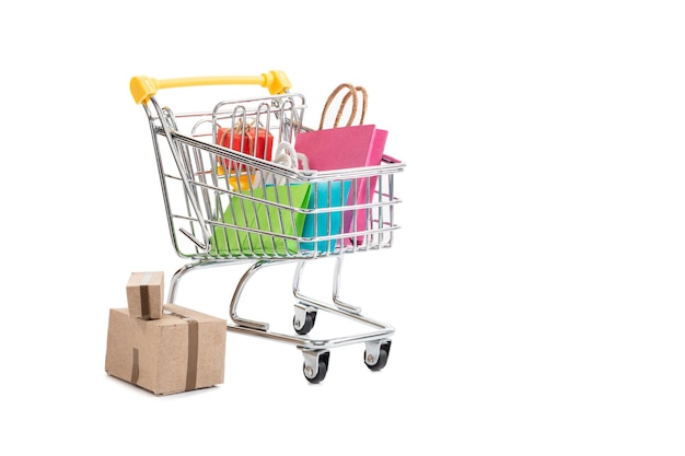 Shopping cart with gifts isolated on white background