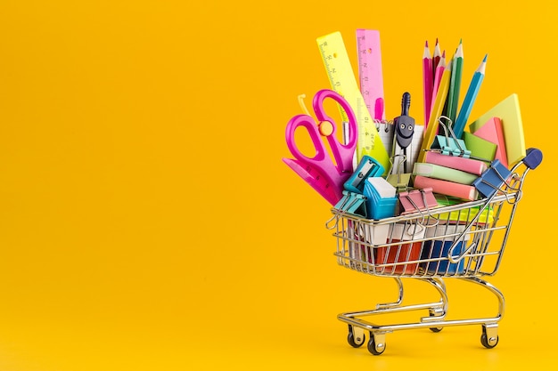 Photo shopping cart with school supplies